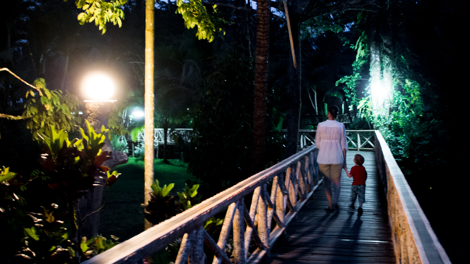 Rowan and I walking at night in the jungle – Sepilok, Borneo