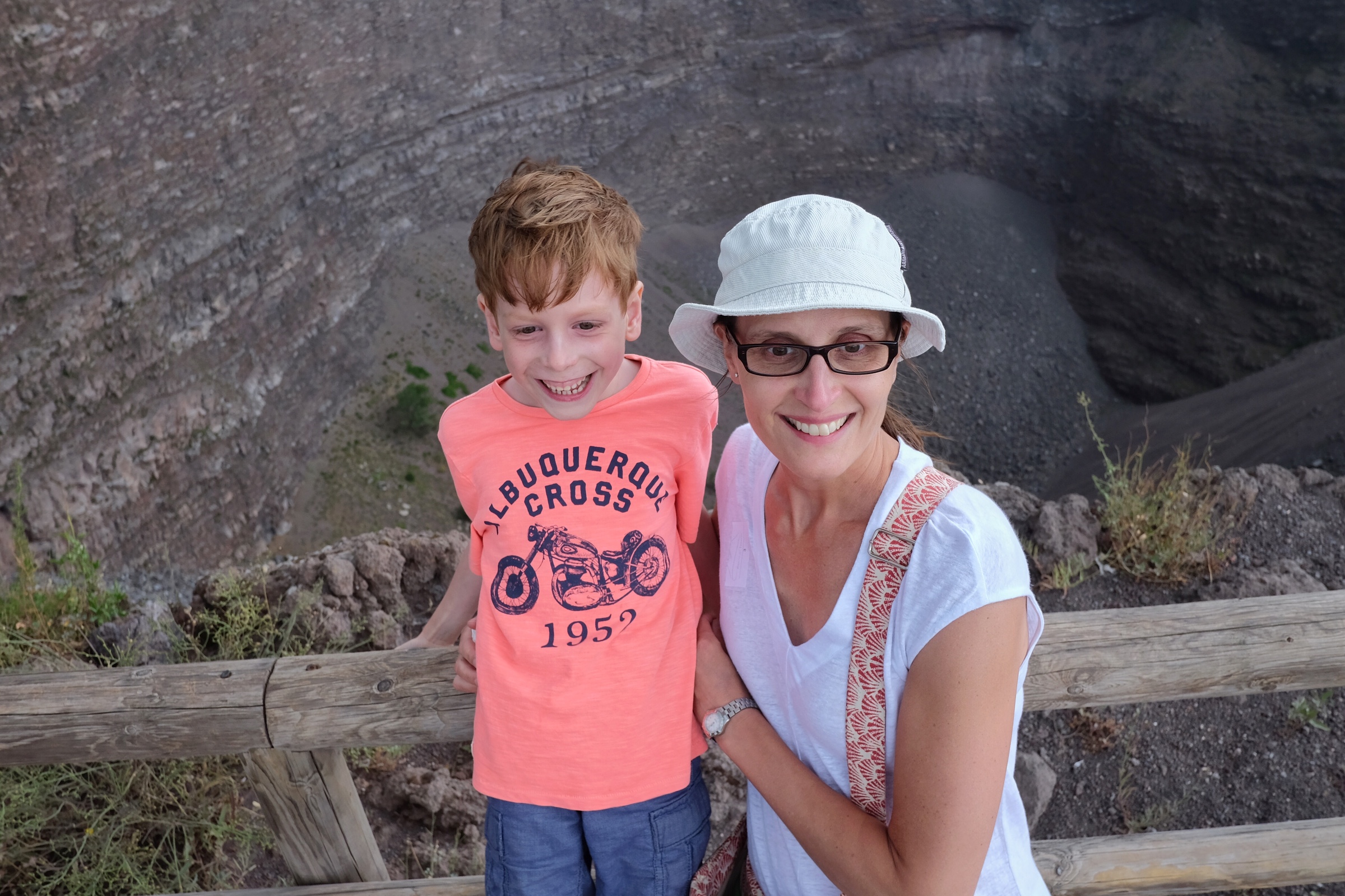 Standing at the top of Mount Vesuvius.