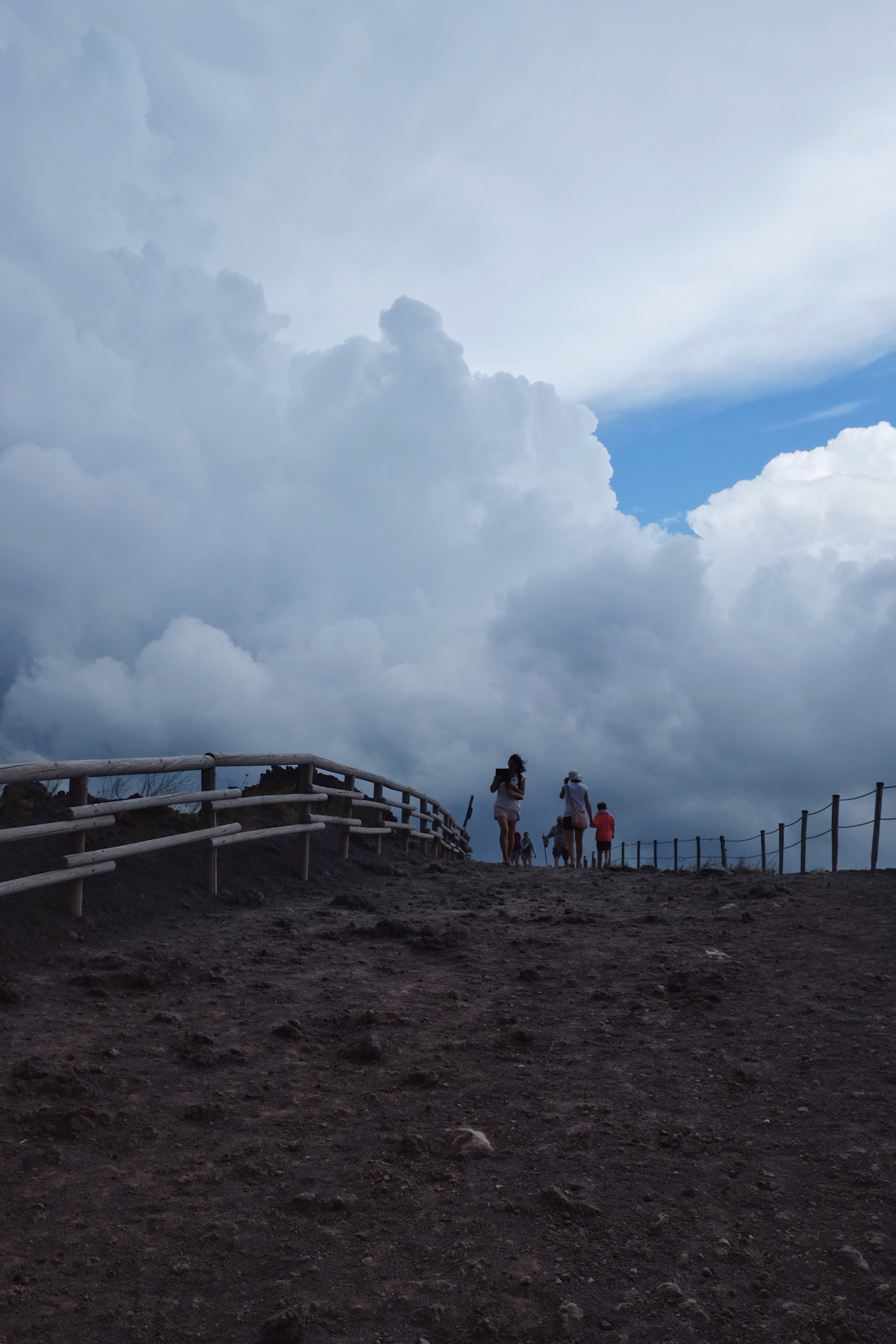 Walking within the clouds on Mount Vesuvius.
