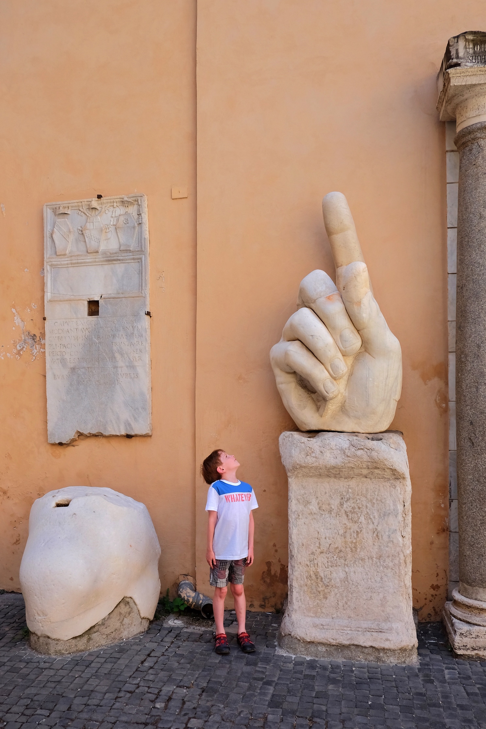 Rowan looking up at the Capitolini Museums.